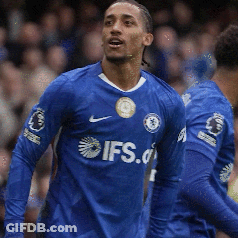 A Soccer Player In A Blue Ifs Jersey Stands In Front Of A Crowd GIF