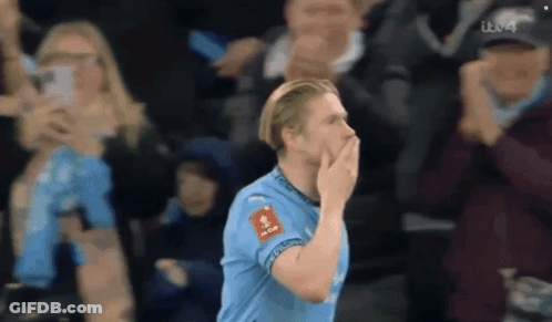 A Soccer Player In A Blue Jersey With A Sticker On His Chest That Says ' Fc Barcelona ' GIF