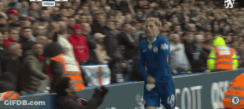 A Soccer Player In A Blue Jersey With The Number 19 On His Shorts GIF