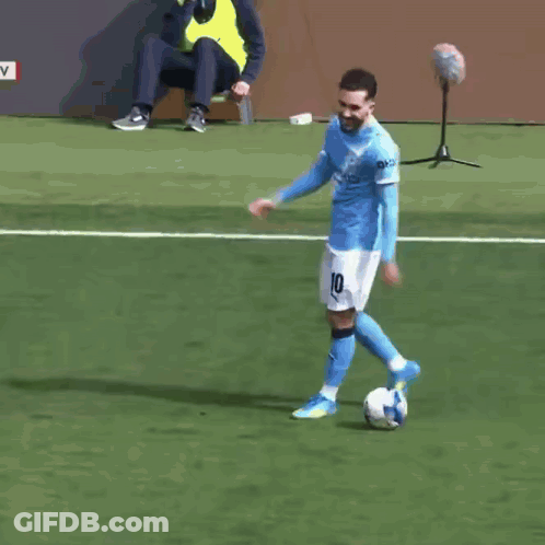 A Soccer Player In A Blue Jersey With The Number 22 On The Back GIF