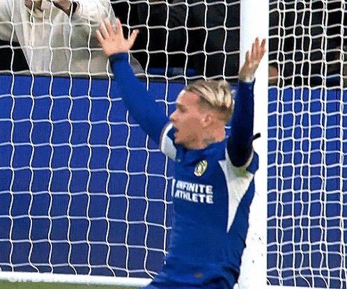 A Soccer Player In A Blue Jersey With The Word Infinite Athlete On It GIF