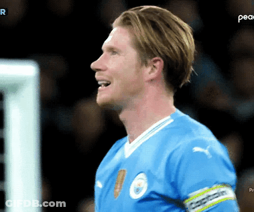 A Soccer Player In A Blue Jersey With The Word Peace On The Bottom Right GIF