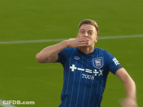 A Soccer Player In A Blue Shirt And White Shorts With The Number 1 On His Shorts GIF