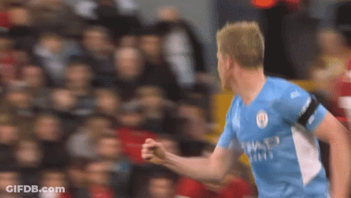 A Soccer Player In A Blue Shirt Is Celebrating A Goal . GIF