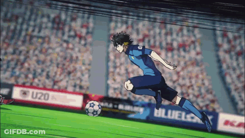 A Soccer Player In A Blue Uniform Is Kicking A Soccer Ball GIF
