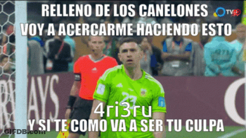 A Soccer Player In A Green Jersey Stands In Front Of A Soccer Goal GIF