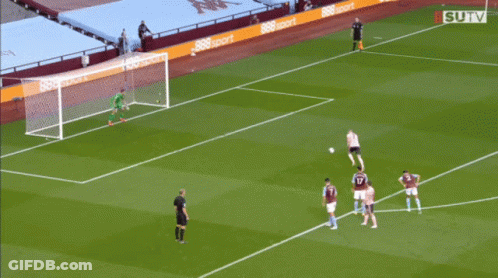 A Soccer Player In A Green Jersey With The Number 21 On It GIF