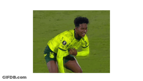 A Soccer Player In A Neon Green Crefisa Jersey Celebrates GIF