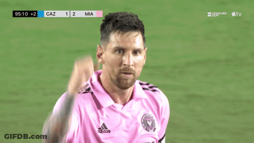 A Soccer Player In A Pink Shirt Looks At The Scoreboard Which Says Caz 1 2 Mia GIF