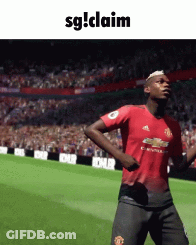 A Soccer Player In A Red Adidas Jersey Is Dancing On A Field GIF