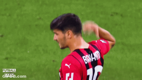 A Soccer Player In A Red And Black Emirates Fly Better Jersey GIF