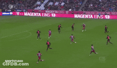 A Soccer Player In A Red And Blue Jersey With The Year 2014/15 On The Bottom GIF