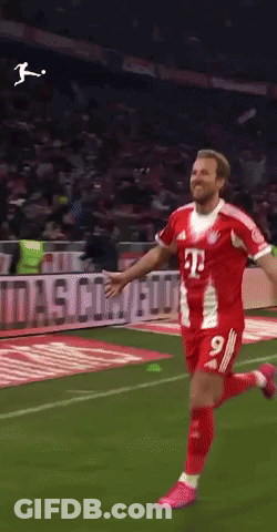 A Soccer Player In A Red And White Jersey With The Number 9 On It GIF
