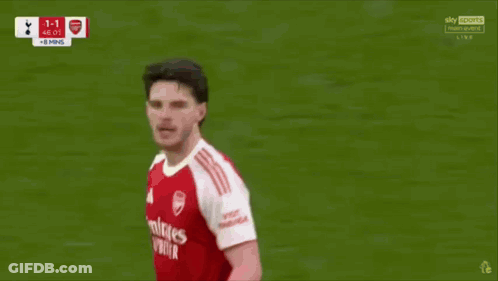 A Soccer Player In A Red And White Jersey With The Word Emirates On It GIF