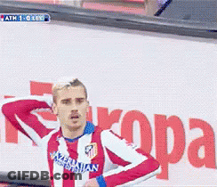 A Soccer Player In A Red And White Uniform With The Word Azerbaijan On The Front GIF