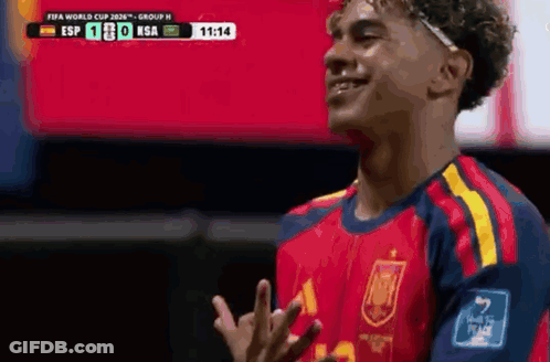 A Soccer Player In A Red And Yellow Jersey Is Giving A Middle Finger GIF