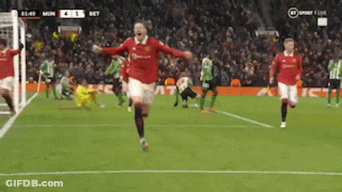 A Soccer Player In A Red Jersey Runs On The Field GIF