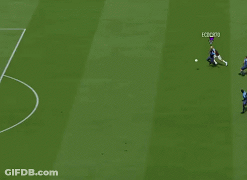A Soccer Player In A Red Jersey Stands On The Field GIF