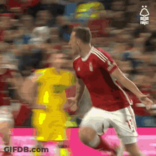 A Soccer Player In A Red Jersey With The Number 11 On It GIF