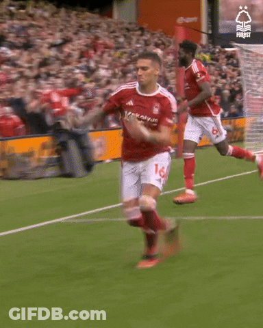 A Soccer Player In A Red Jersey With The Number 14 On It GIF