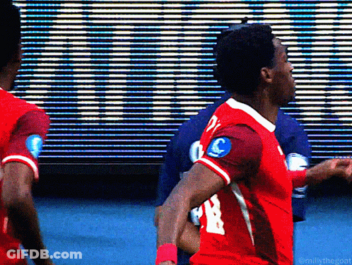 A Soccer Player In A Red Jersey With The Number 21 On The Back GIF
