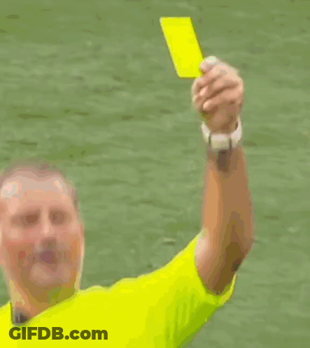 A Soccer Player In A Red Shirt Is Getting A Yellow Card GIF