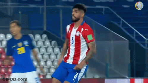 A Soccer Player In A Red White And Blue Uniform With The Number 3 On It GIF