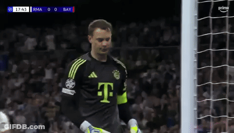 A Soccer Player In A T-Mobile Jersey Stands In Front Of The Goal GIF