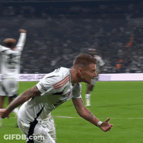 A Soccer Player In A White Jersey With The Number 11 On It GIF