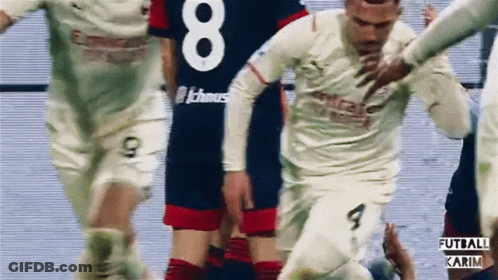A Soccer Player In A White Jersey With The Number 8 On It GIF