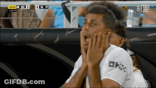 A Soccer Player In A White Shirt With Ok On The Sleeve GIF