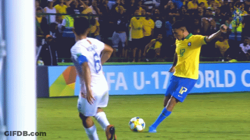 A Soccer Player In A Yellow Jersey With The Number 13 On It GIF