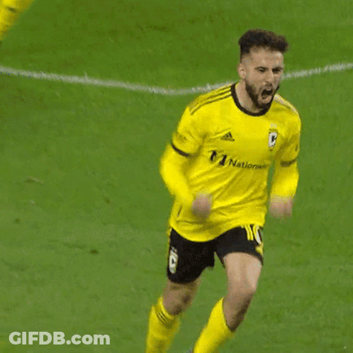 A Soccer Player In A Yellow Jersey With The Number 20 On It GIF