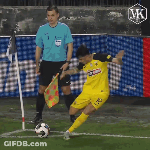 A Soccer Player In A Yellow Jersey With The Number 21 On It GIF