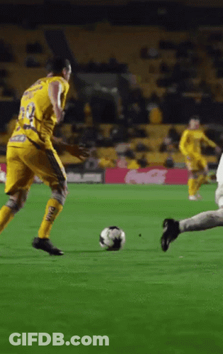A Soccer Player In A Yellow Jersey With The Number 23 On It GIF
