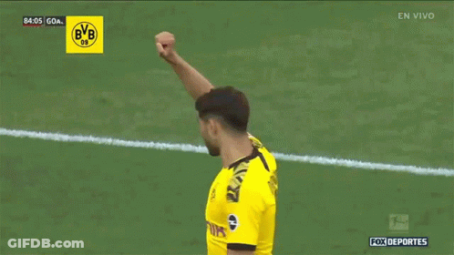 A Soccer Player In A Yellow Jersey With The Number 5 On The Back GIF