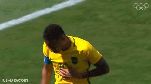 A Soccer Player In A Yellow Shirt With The Number 10 On It GIF