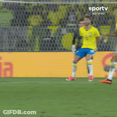 A Soccer Player In A Yellow Shirt With The Number 10 On It GIF