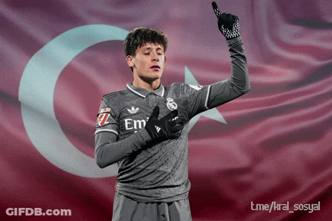 A Soccer Player In Front Of A Flag That Says Em GIF