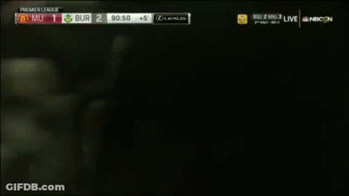 A Soccer Player Is Celebrating A Goal During A Game GIF