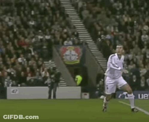A Soccer Player Is Celebrating A Goal In Front Of A Bayer Banner GIF