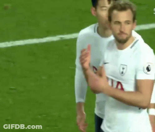 A Soccer Player Is Giving A Thumbs Up Sign While Standing On A Field . GIF