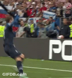 A Soccer Player Is Jumping In The Air On A Field In Front Of A Sign That Says Po GIF