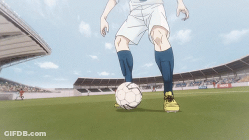 A Soccer Player Is Kicking A Ball In A Stadium With A Motul Ad GIF