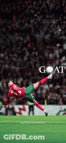 A Soccer Player Is Kicking A Ball With The Word Goat Written On The Bottom GIF