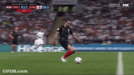 A Soccer Player Is Kicking A Soccer Ball On A Field Sponsored By Mcdonalds GIF