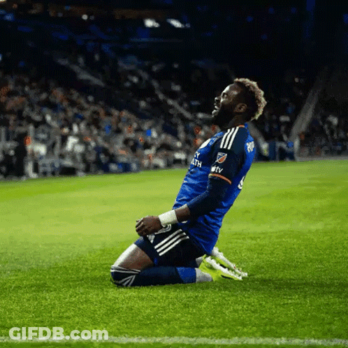 A Soccer Player Is Kneeling On The Field And His Jersey Says Mtv On The Sleeve GIF
