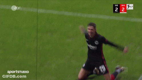 A Soccer Player Is Kneeling On The Field With A Score Of 2 To 2 GIF