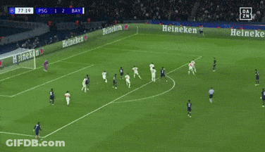 A Soccer Player Is Laying On The Field During A Game Between Psg And Bay .. GIF