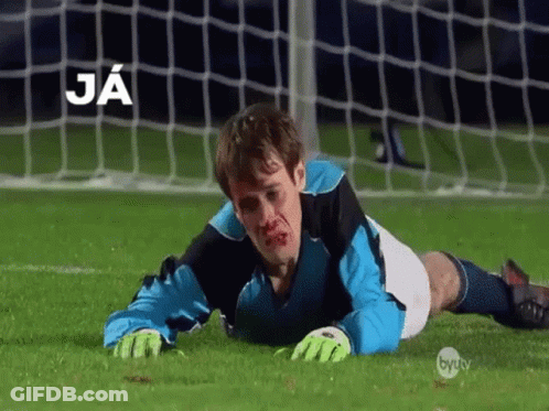 A Soccer Player Is Laying On The Field With Blood On His Face And The Word Ja Above Him GIF